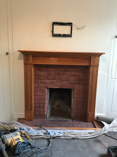 Fireplace and chimney breast before knock out