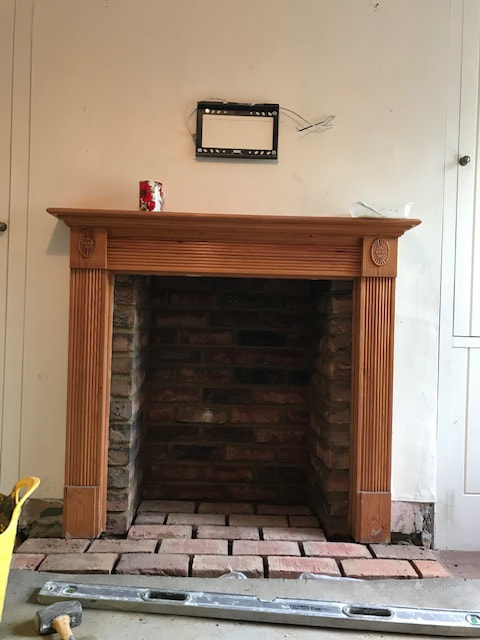 Fireplace and chimney breast after knock out