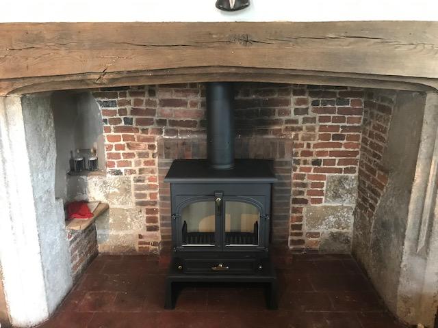 Double door stove in Inglenook fireplace fitted in Tunbridge Wells