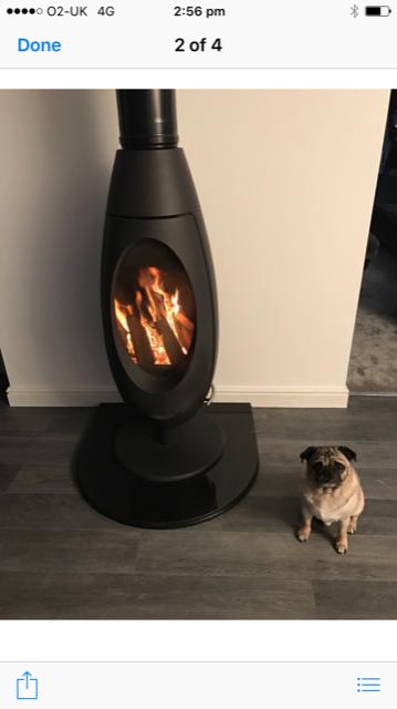 Spatherm wood burning stove on slate hearth