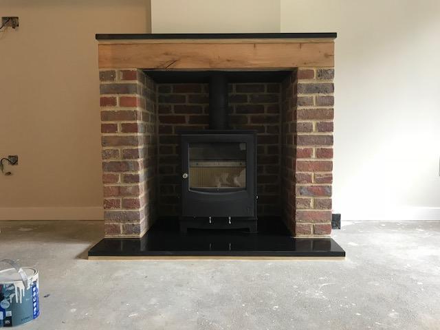 Morso stove in brick built fireplace, fitted in Tunbridge Wells